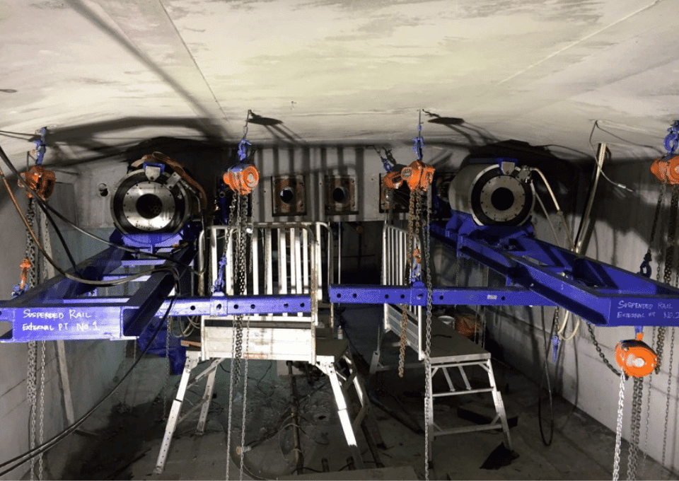 Post-tensioning bars to assembly segments of TMCLK Link